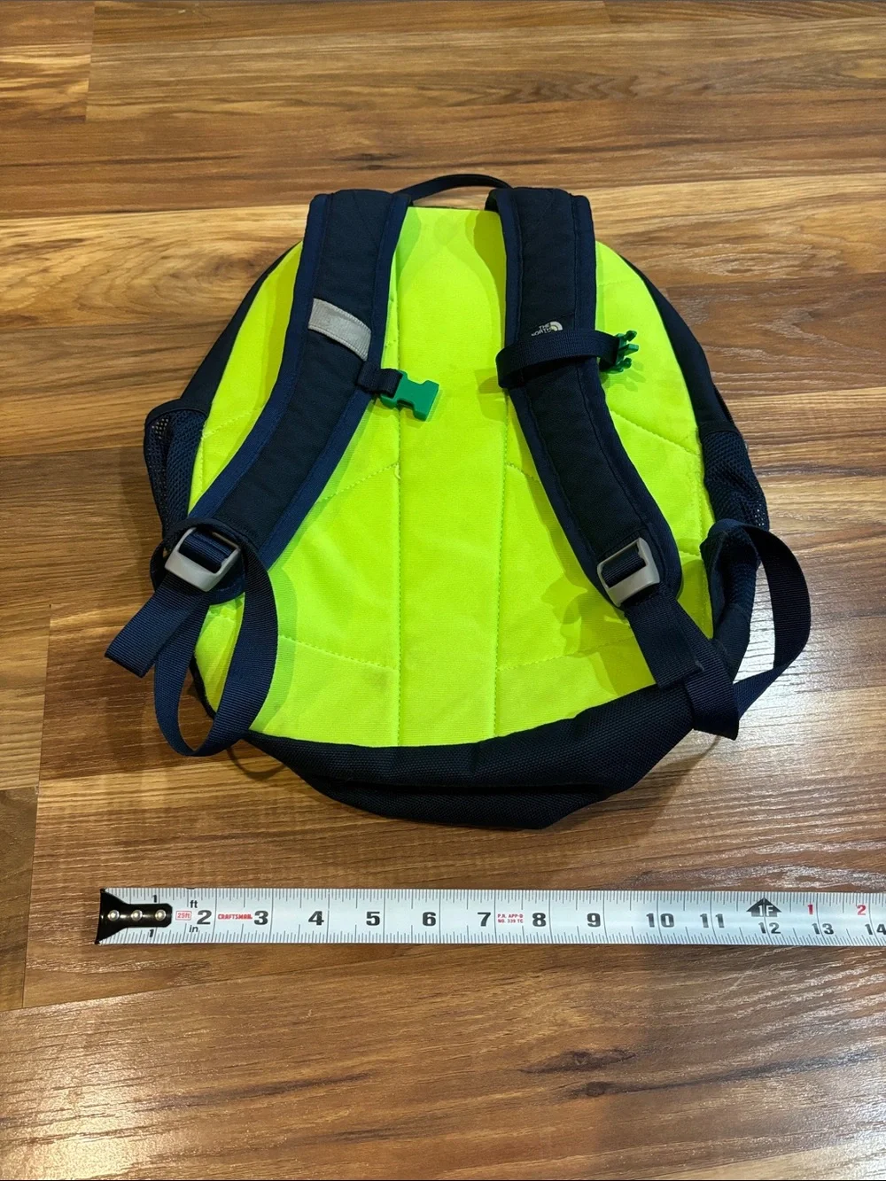 The North Face Black Backpack with Neon Green Lightning Print